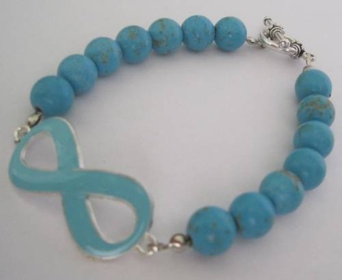 Turquoise coloured infinity bracelet