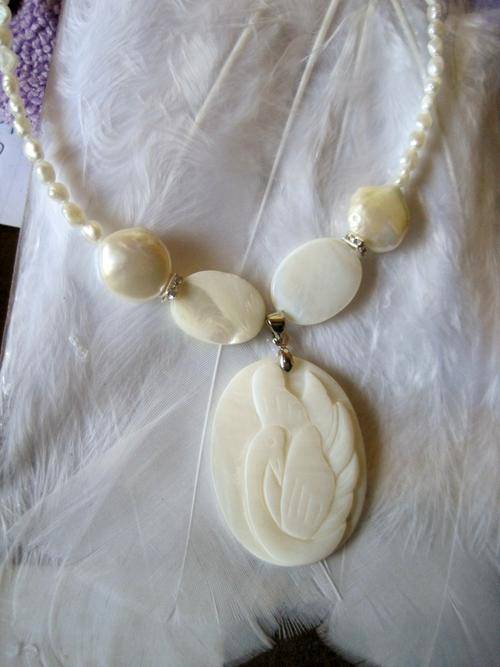 Mother-of-pearl carved swan pendant, on pearls and MOP. Unique.