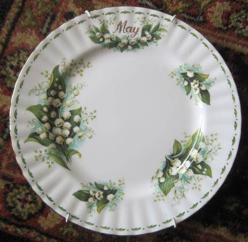 Royal Albert "May" wall plate, 'Lilies of the Valley'.
