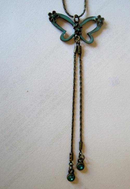 Dainty turquoise-coloured butterfly necklace, with crystals.