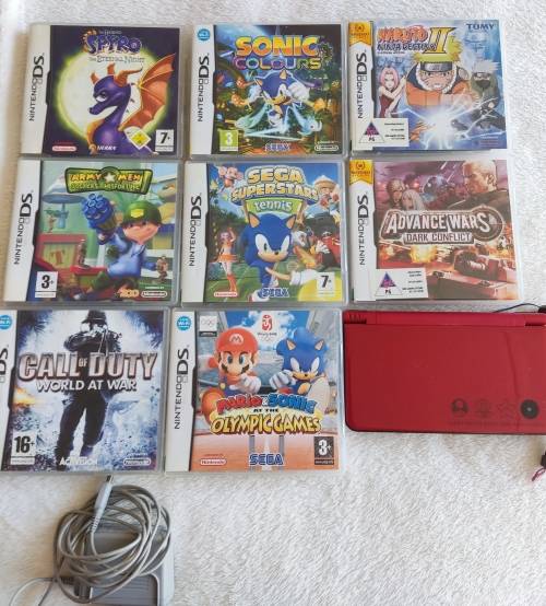 Nintendo Dsi Xl Super Mario Bros 25th anniversary edition and games bundle