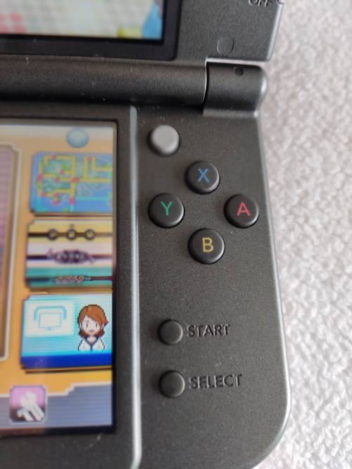 "New" Nintendo 3ds XL with original packaging, charger and stylus