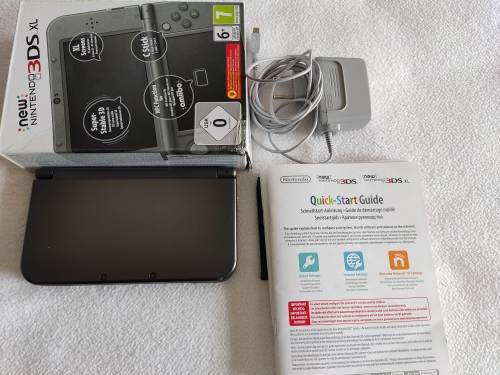 "New" Nintendo 3ds XL with original packaging, charger and stylus