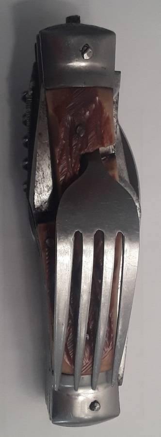 A  vintage multi-tool utility knife with original pouch.  Awesome!!!