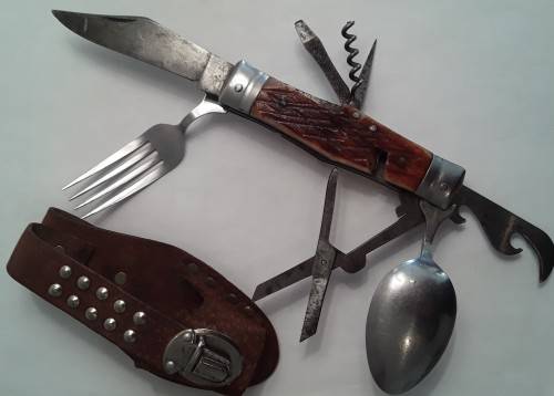 A  vintage multi-tool utility knife with original pouch.  Awesome!!!