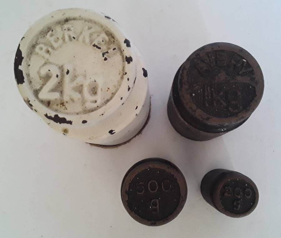 Set Of 4 Antique Scale Weights.