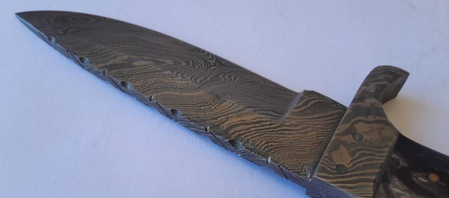 A Superb Damascus Blade Hunting Knife With Leather Sheath And Display Stand.