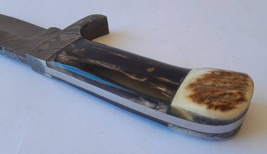 A Superb Damascus Blade Hunting Knife With Leather Sheath And Display Stand.