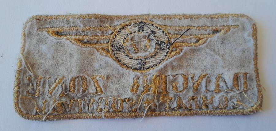 Large `Danger Zone Combat & Survival` Badge.
