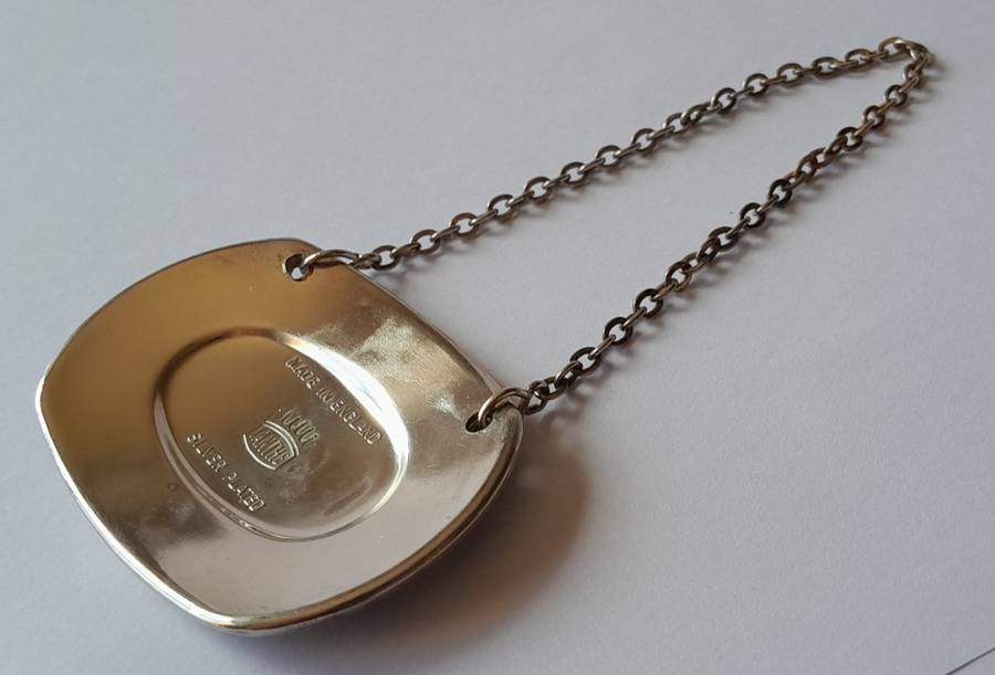 A Vintage Silver Plated `BRANDY` Bottle Decanter Label By `Ianthe, England`.