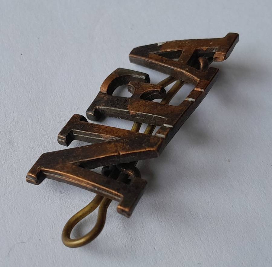 Early Natal Field Artillery Shoulder Title.  Lugs Intact.