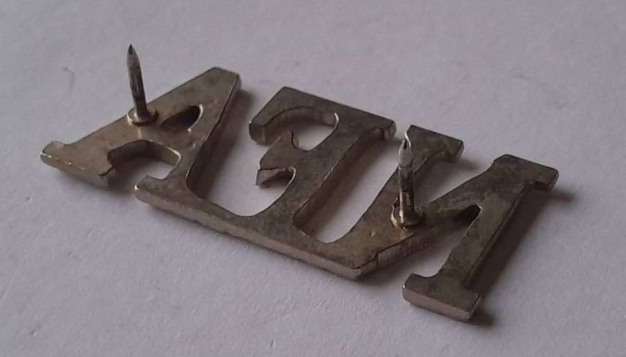 Natal Field Artillery Shoulder Title.  Pins Intact.