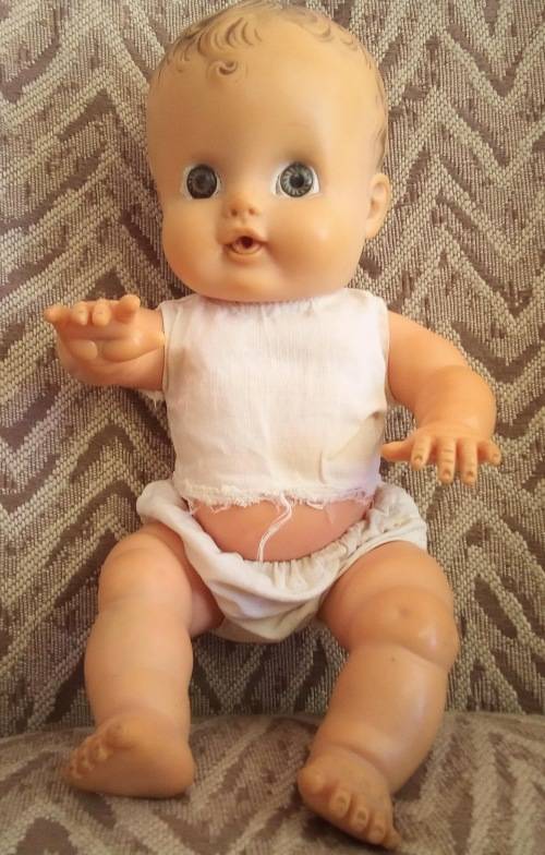 Small vintage soft rubber doll