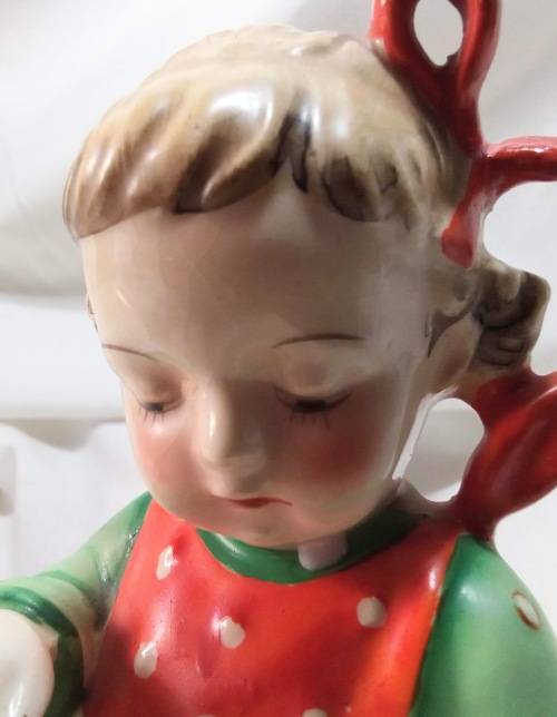 Two beautiful Hummel style little girls reading - Bookends