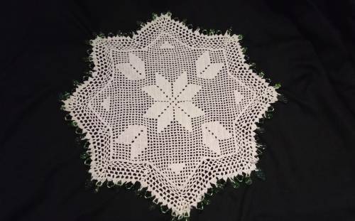 White Vintage crocheted jug cover with green glass beads