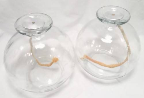 Two large glass oil burners