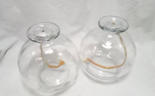 Two large glass oil burners