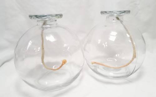 Two large glass oil burners