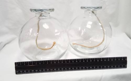 Two large glass oil burners
