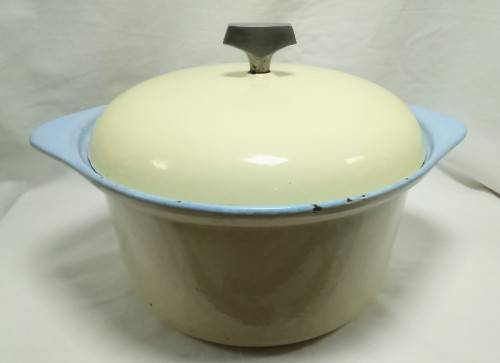 Vintage Yellow round cast iron casserole dish with lid