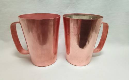 Two beautiful vintage Rhodesian copper mugs by Richard Mead