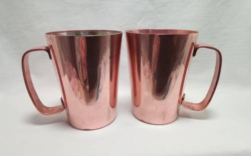 Two beautiful vintage Rhodesian copper mugs by Richard Mead