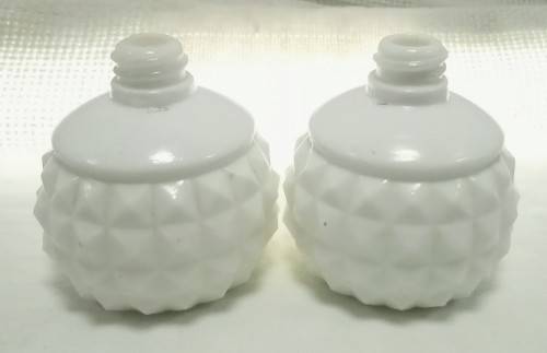 Two tiny Vintage milk glass bottles