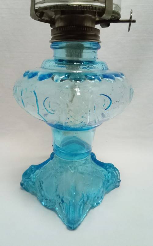 Gorgeous vintage Turquoise glass paraffin lamp