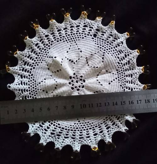 Round Vintage doilie with yellow glass beads