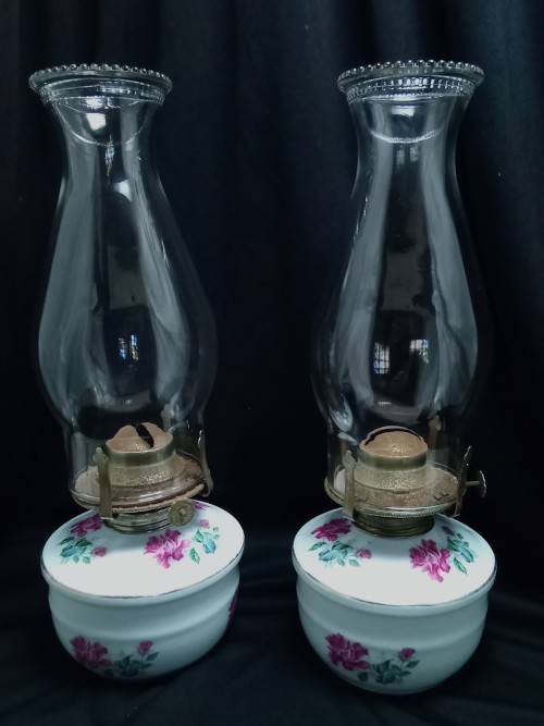 Pair of vintage porcelain paraffin lamps