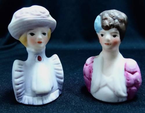 Two Avon thimbles