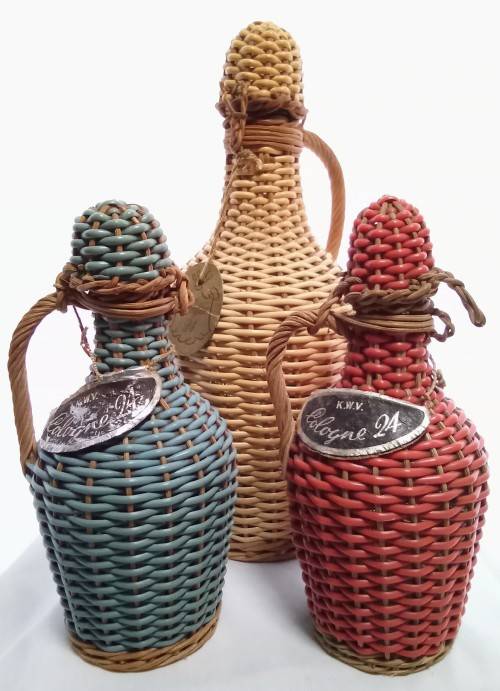 Three vintage KWV cologne bottles