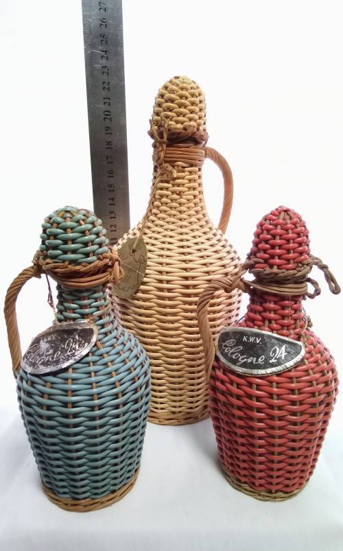 Three vintage KWV cologne bottles