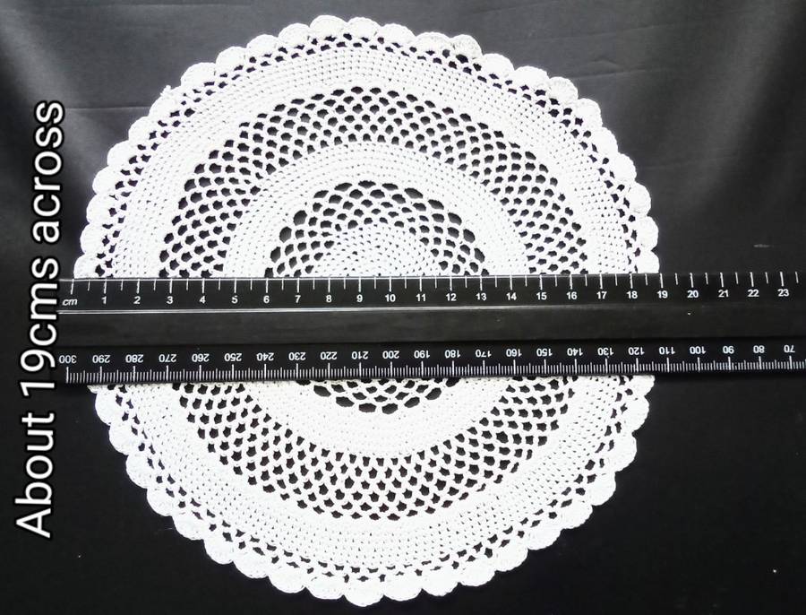 Beautiful Crocheted doily - about 19cms across