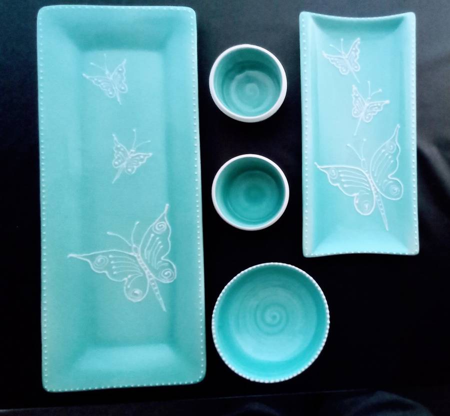 Very pretty hand made turquoise ceramic serving set