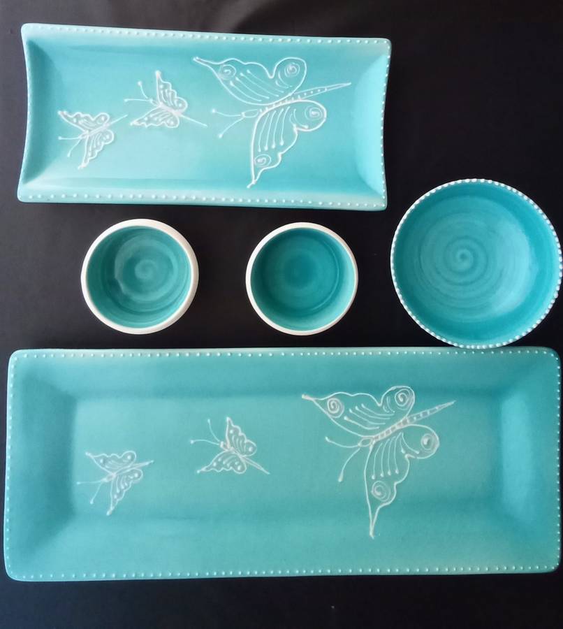 Very pretty hand made turquoise ceramic serving set