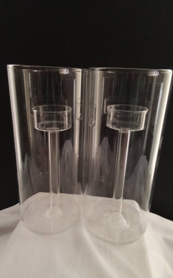 Two glass candle holders