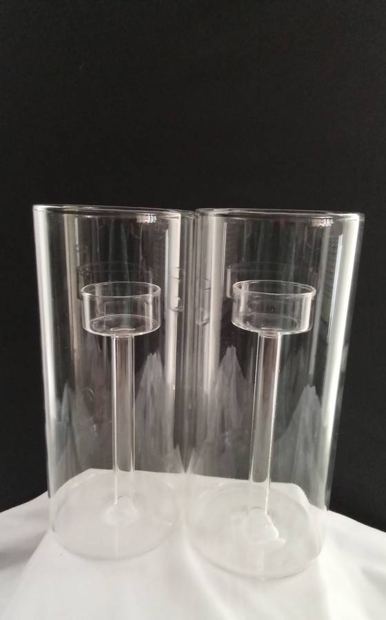 Two glass candle holders
