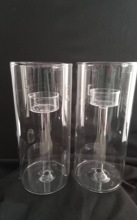 Two glass candle holders