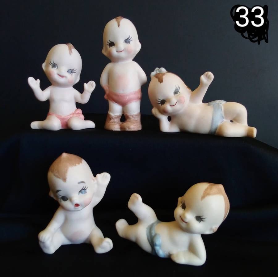 Beautiful set of 5 hand painted porcelain kewpies