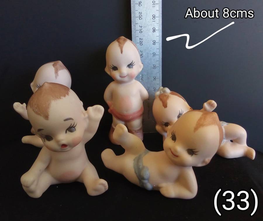 Beautiful set of 5 hand painted porcelain kewpies