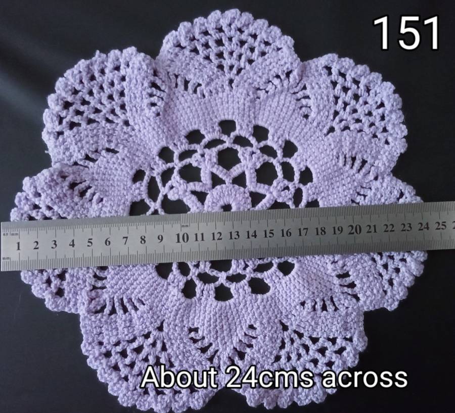 Beautiful light purple crocheted doily - about 24cms across