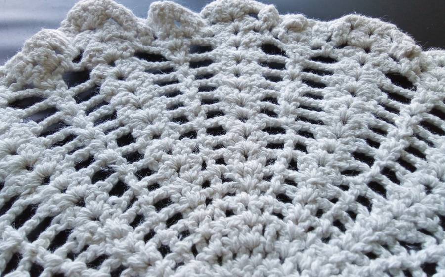 Lovely off-white crocheted doily - 30cms across