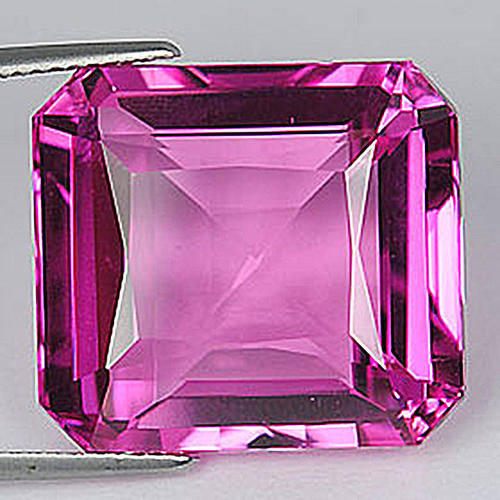 !!HUGE!! 39.02ct STUNNING RASPBERRY PINK TOPAZ. EMERALD CUT.