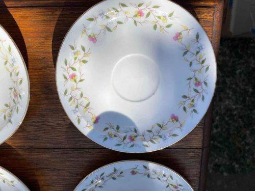 Set of six tea cups and saucers