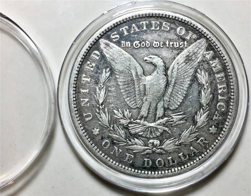 U S A SILVER MORGAN DOLLAR 1879-(142 YEARS OLD)PHILADELPHIA MINT GOOD CONDITION WITH CAPSULE