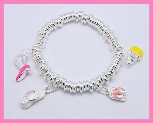 *R1* - TRENDY SILVER 4 SHOE CHARM BRACELET