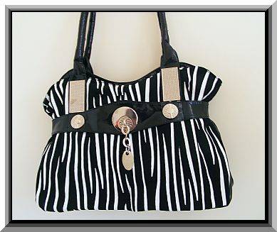 BEAUTIFUL BLACK AND WHITE STRIPED HANDBAG WITH SILVER DETAIL