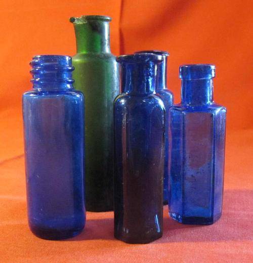 Collection of 5 Poison or Medicine Glass Bottles, in Blue and Green Glass