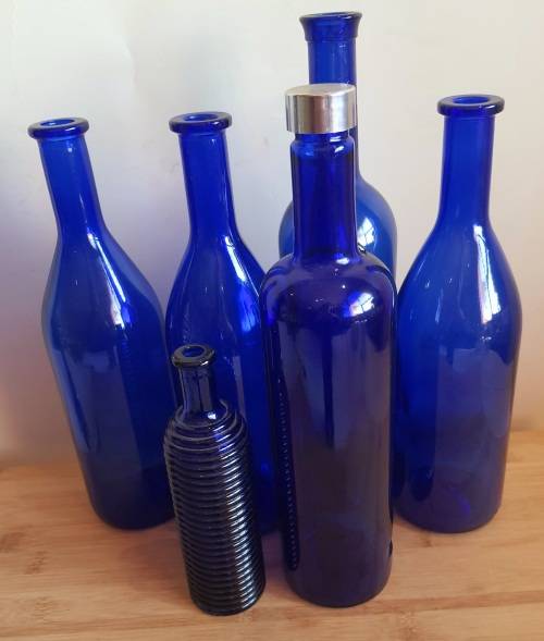 Lot of 6 Cobalt Blue Glass Bottles and 2 Vases - Bid for ALL